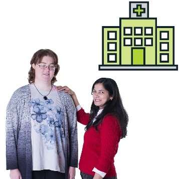 A person placing their hand on the shoulder of another person in a supportive way next to a hospital icon.